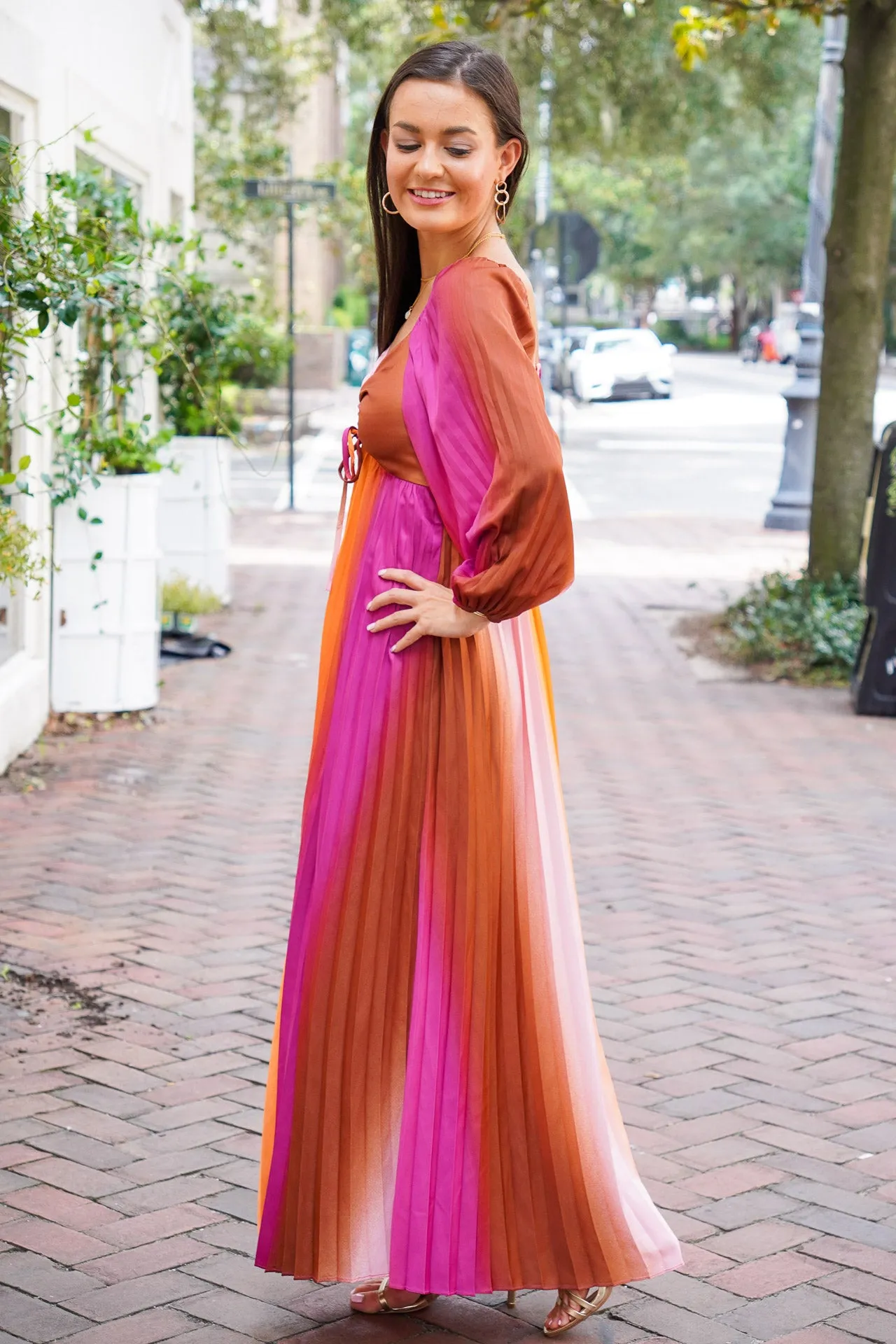 Sure! Here are some optimized title suggestions for the Sunset Maxi Dress:

1. Elegant Sunset Maxi Dress with Flowing Skirt - Perfect for Summer Evenings
2. Chic Sunset-Inspired Maxi Dress - Flattering and Comfortable for All Occasions
3. Stylish Sunset Ombre Maxi Dress - Breezy and Trendy for Any Occasion
4. Beautiful Sunset Print Maxi Dress - Lightweight and Airy for Warm Days
5. Vibrant Sunset-Colored Maxi Dress - Ultimate Comfort and Style for Everyday Wear

Feel free to choose or modify any of these titles!